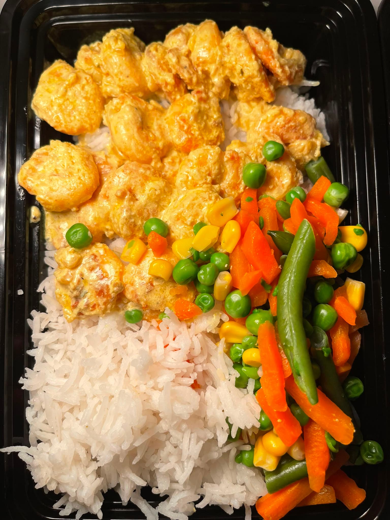Garlic Shrimp & Rice, packed and ready for delivery